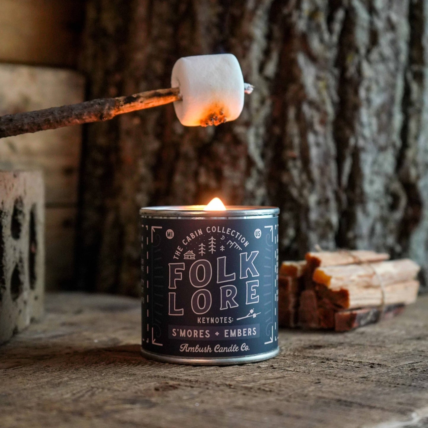Folkore Cabin, Smores and Embers, cosy scene toasting marshmallows over the tin candle