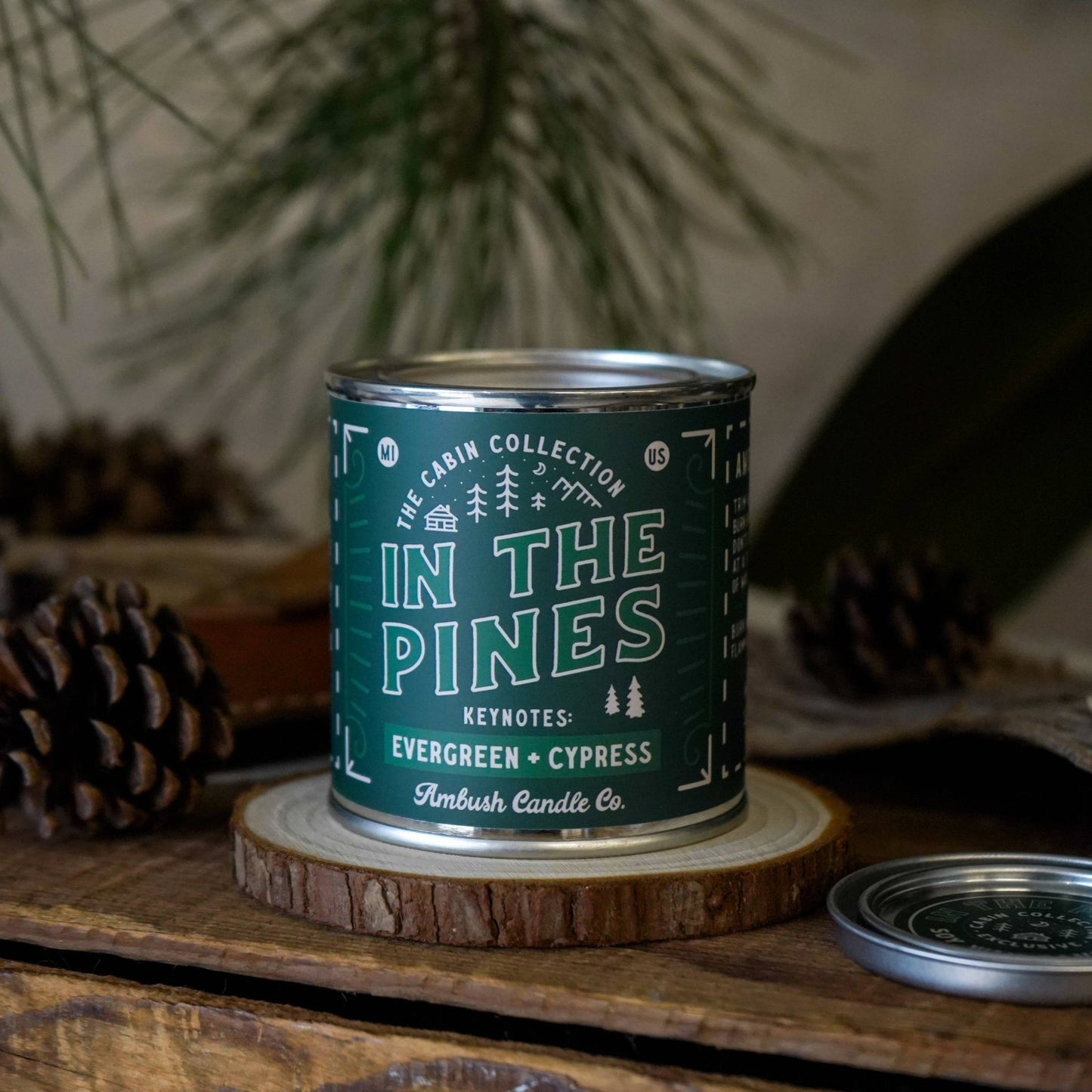In the Pines wood wick candle with key notes of Evergreen and cypress