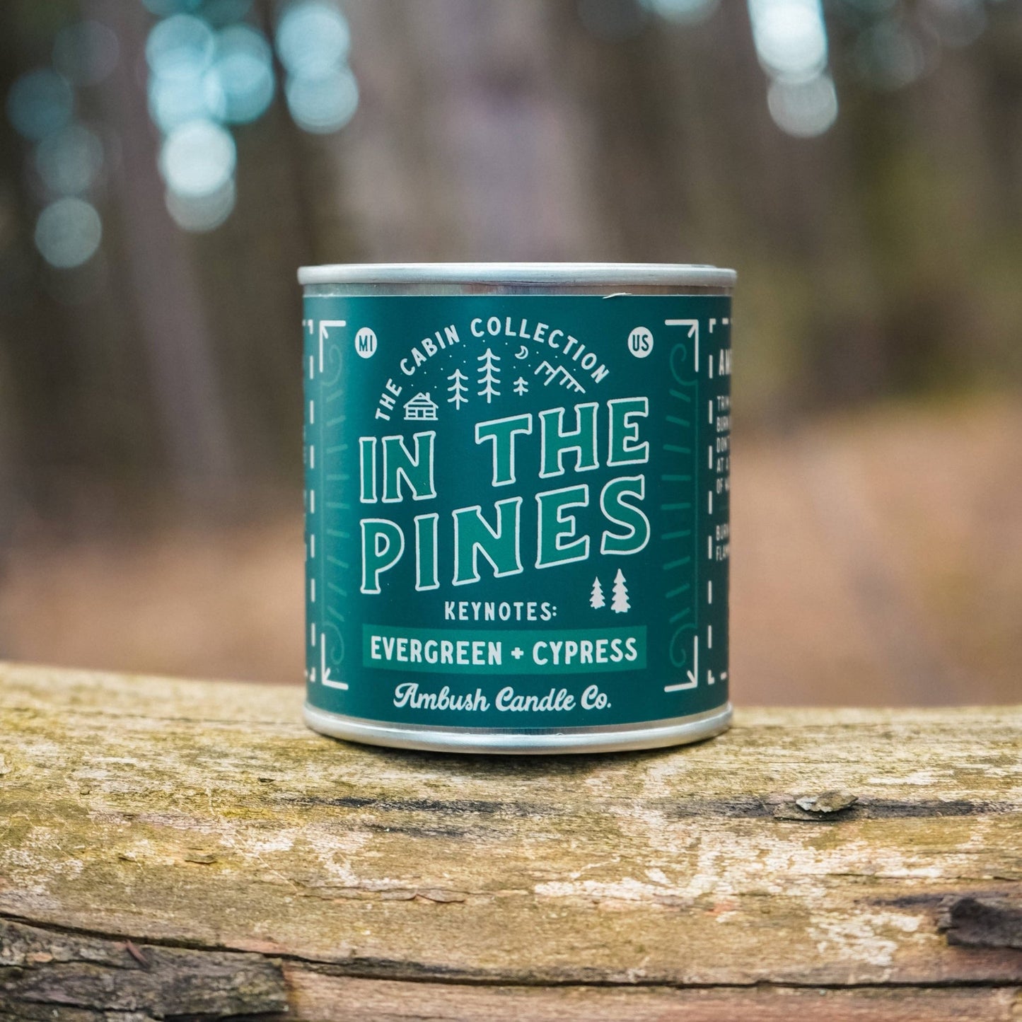 In the Pines wood wick candle with key notes of Evergreen and cypress
