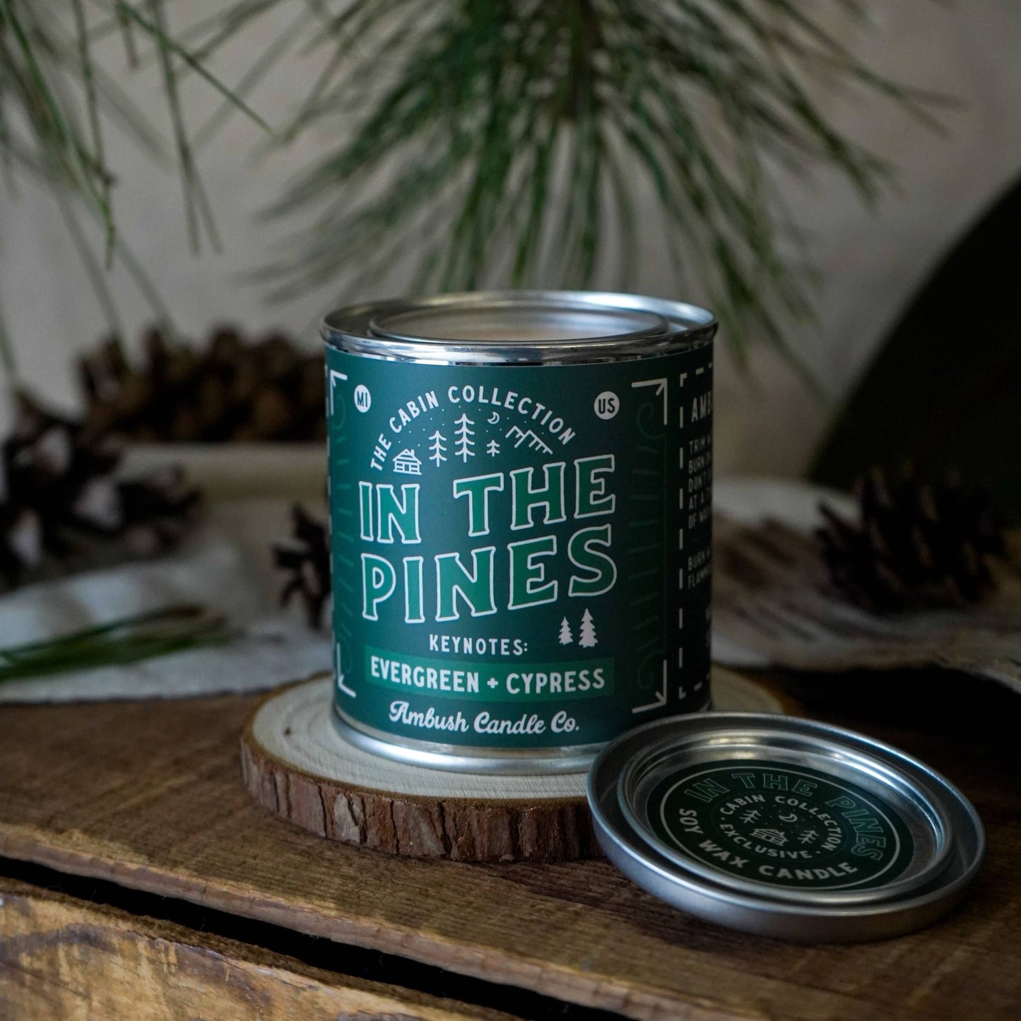 In the Pines wood wick candle with key notes of Evergreen and cypress