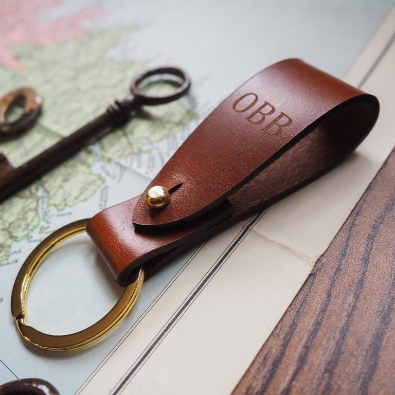 Sam browne detailing in brass on the leather key ring strap