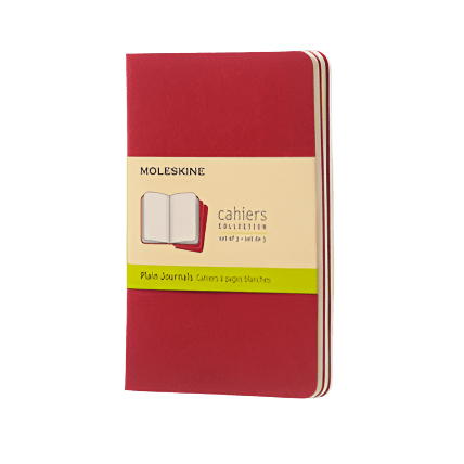 Red Moleskine notebook  on a white background