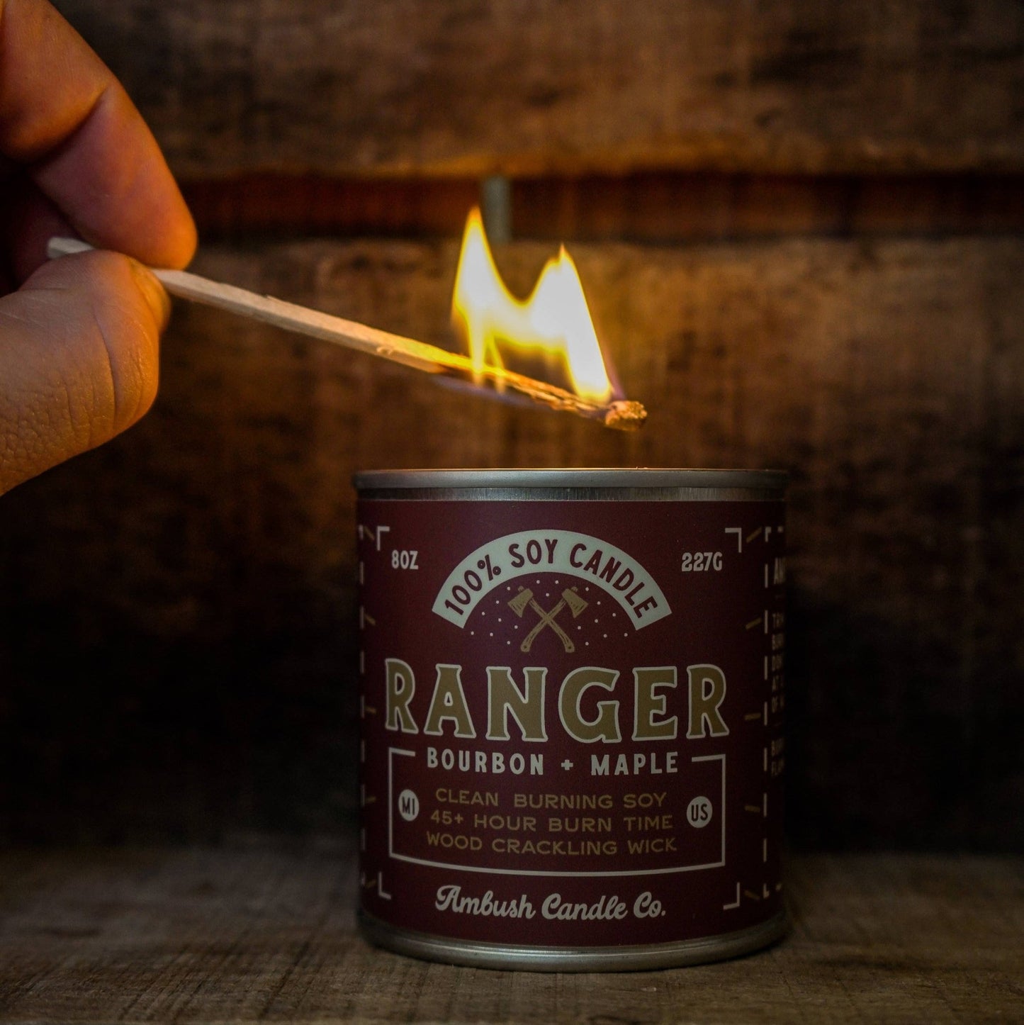Ranger Bourbon and Maple Candle tin being lit