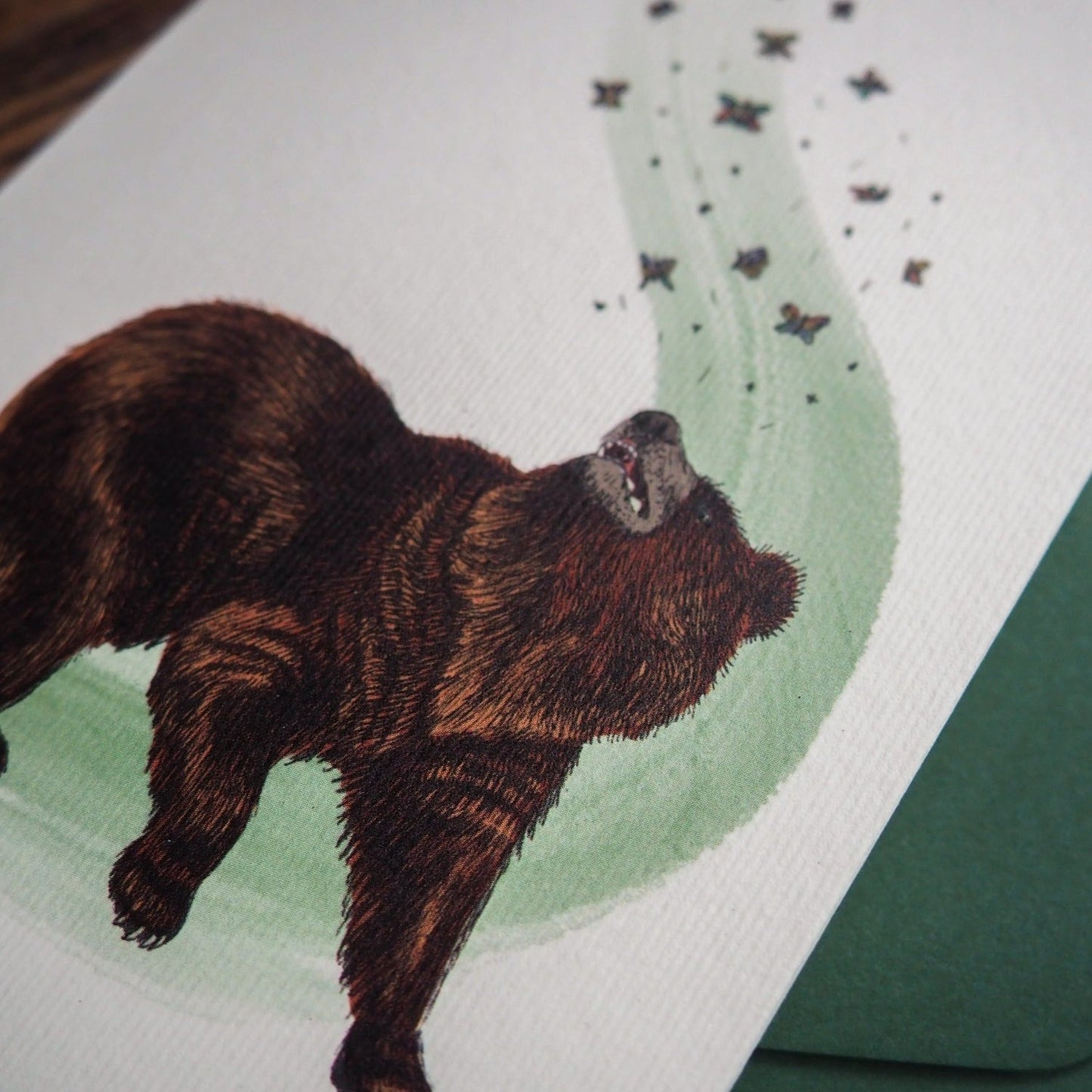 A vintage-inspired bear greeting card with an outdoor theme.