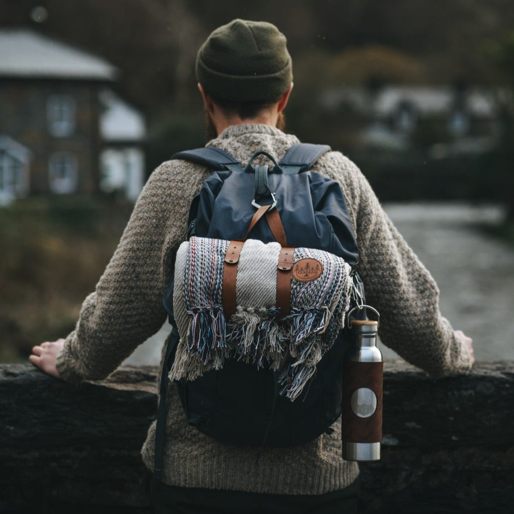 The Camper blanket attached to a rucksack