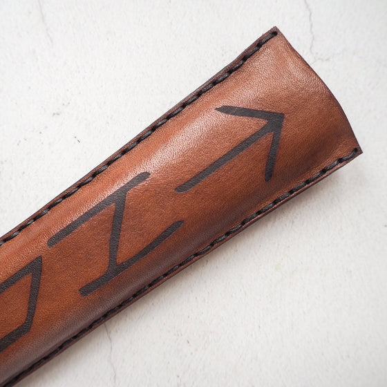 Close-up view on the engraving of the drumstick holder from HÔRD.