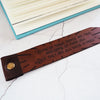 This luxury bookmark has been hand dyed in medium brown leather colour.