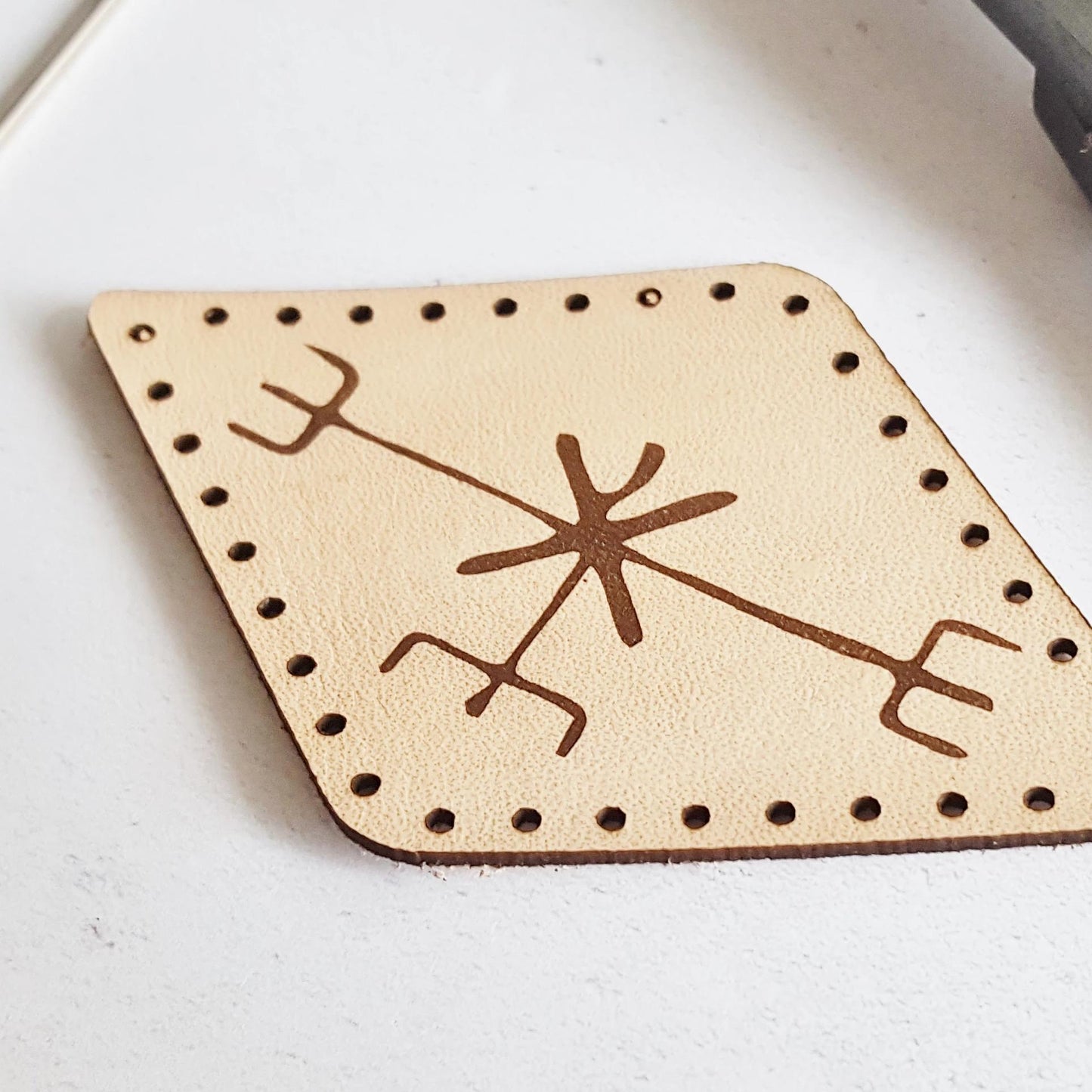 This love patch from Hord is pre-cut with stitch holes ready to be sewn.