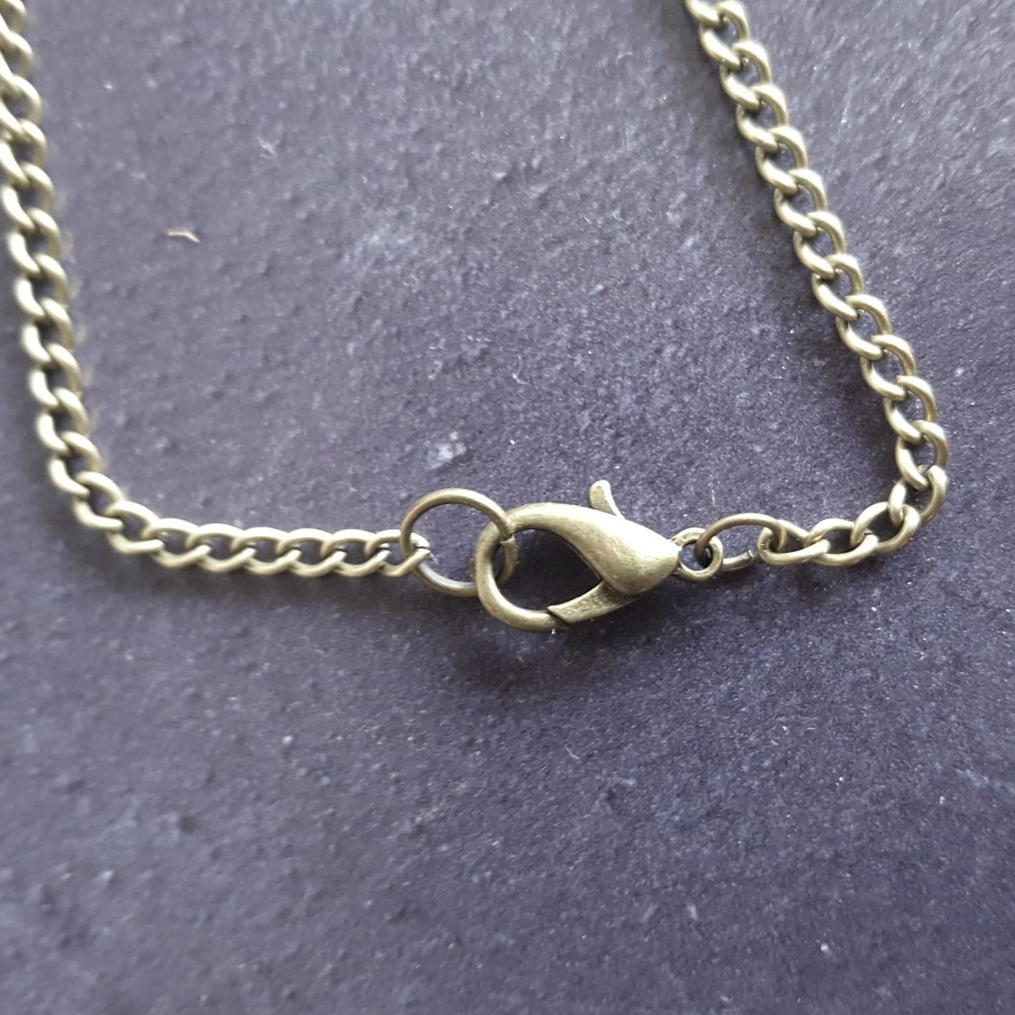 Lobster clasp detailing on the lunar necklace, a lunar jewelry by Hord