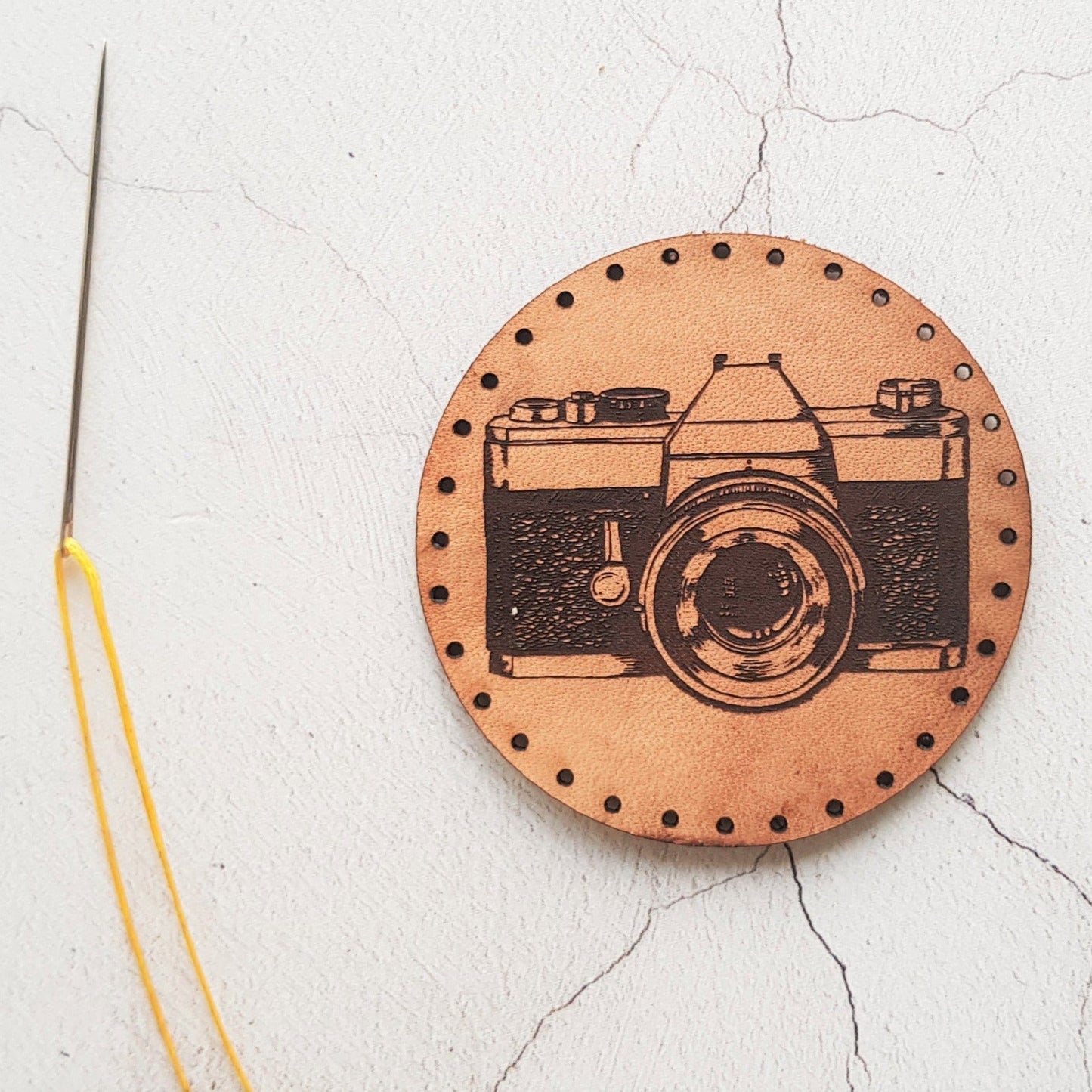 The photographer patch from Hord, hand dyed and engraved.