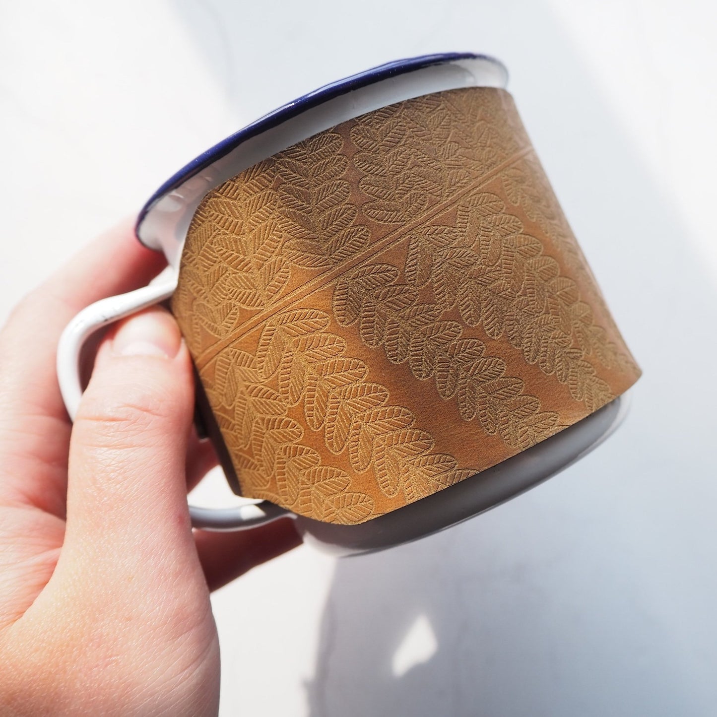 Camping Enamel Mug with Leather Wrap in Fern Leaf design by HÔRD.
