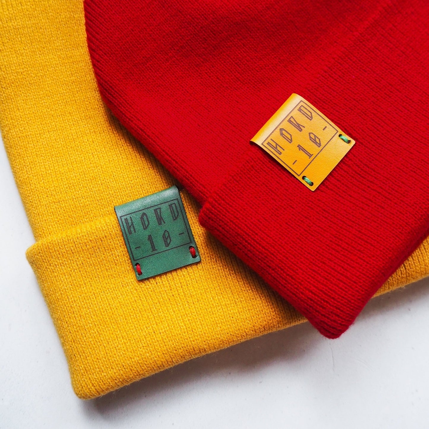This retro beanie hat has been stitched with a leather tab that's engraved with Hord!