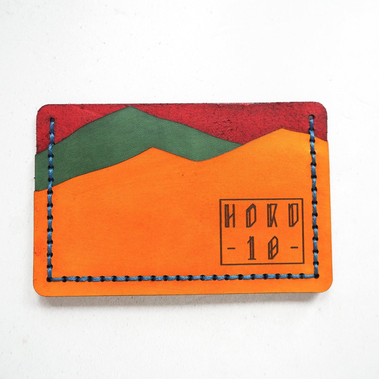 This vintage card holder has been hand dyed and hand stitched at our studio.