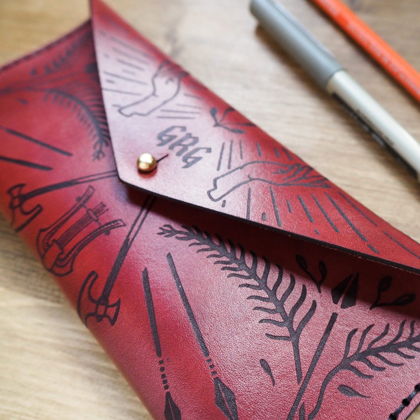 The Dungeoneers Leather Pencil Case fastened with a stud.