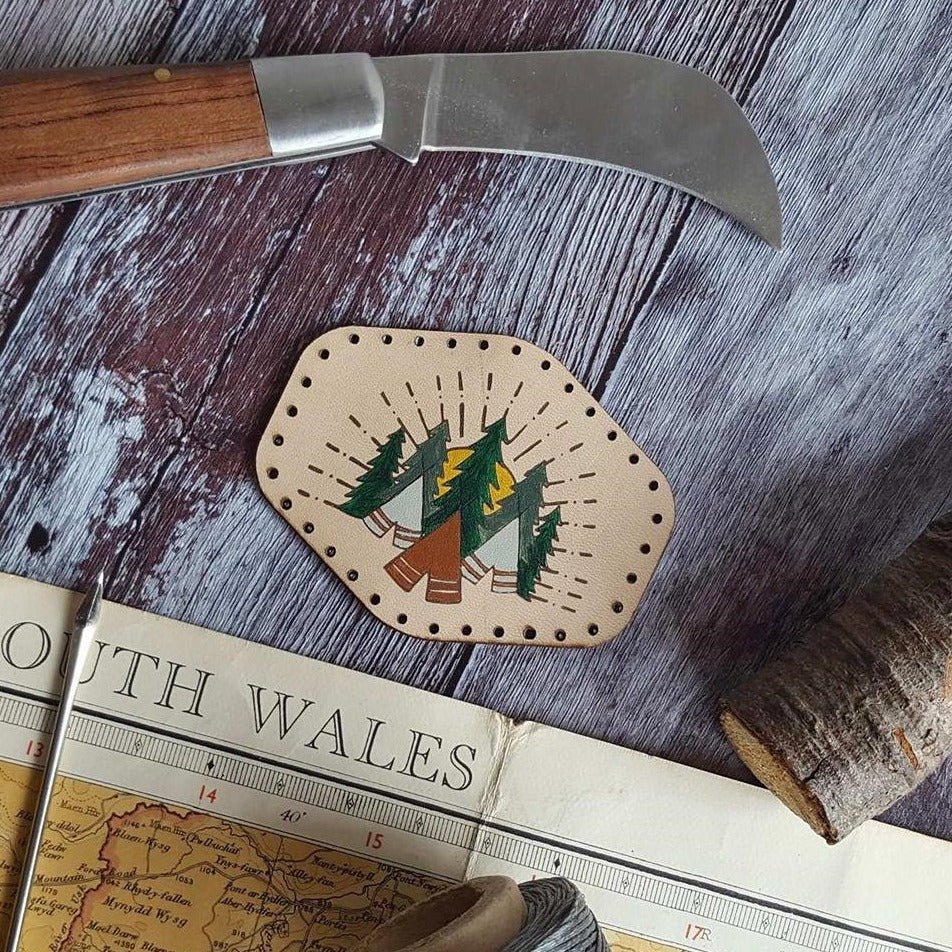 The hord hand painted forest camping leather patch is a great gift for campers and people who love to spend their time outdoors and in the forest. The camping patch from Hord.