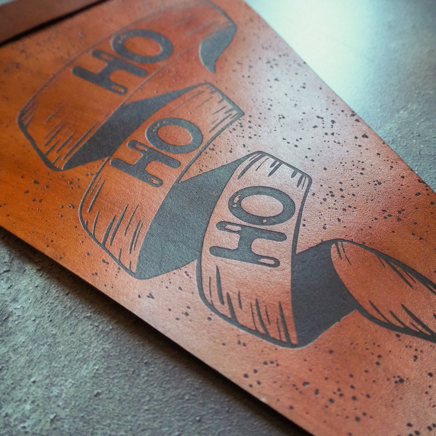 Closer look at the engraving on the Ho Ho Ho Banner, a large Christmas banner from Hord.