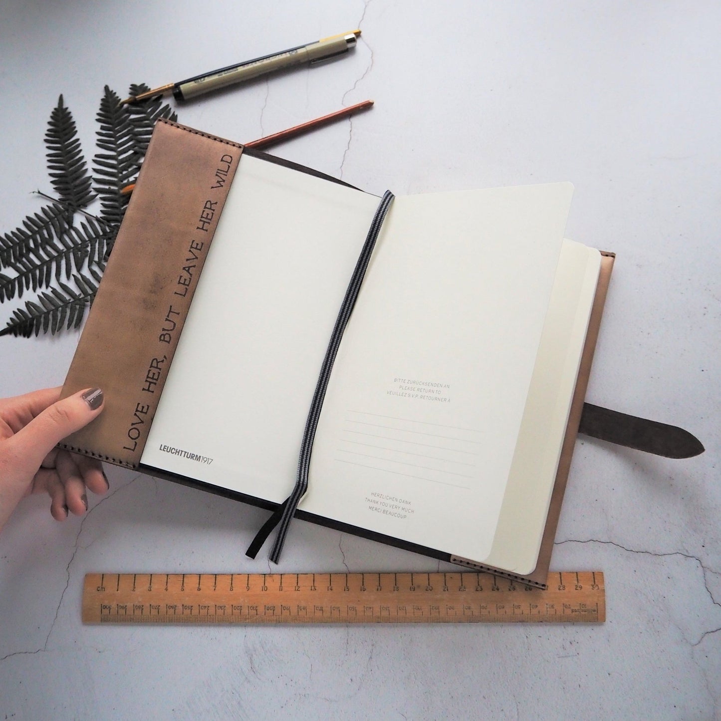 Inner sleeve personalised with an engraving of custom text of the Moth Notebook.