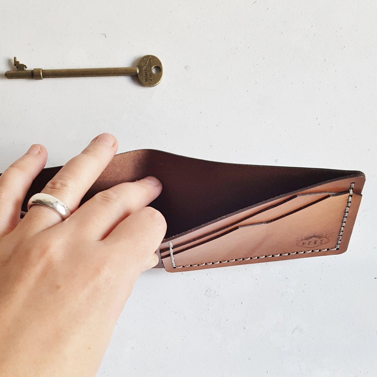 The cash compartment of the Mountain Wallet, Slimline Bi-Fold, an engraved leather wallet from Hord.