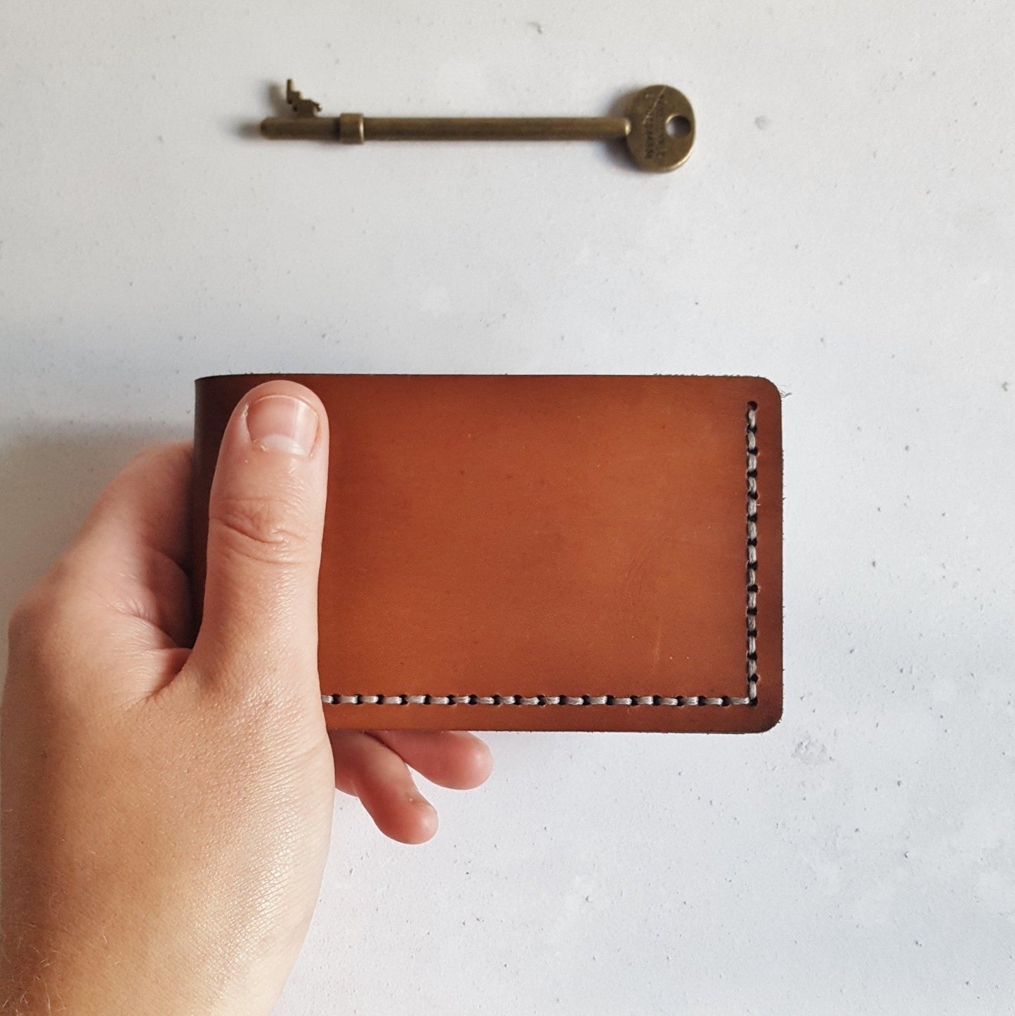 This Mountain Wallet, Slimline Bi-Fold is hand dyed and hand stitched in your choice of colours.