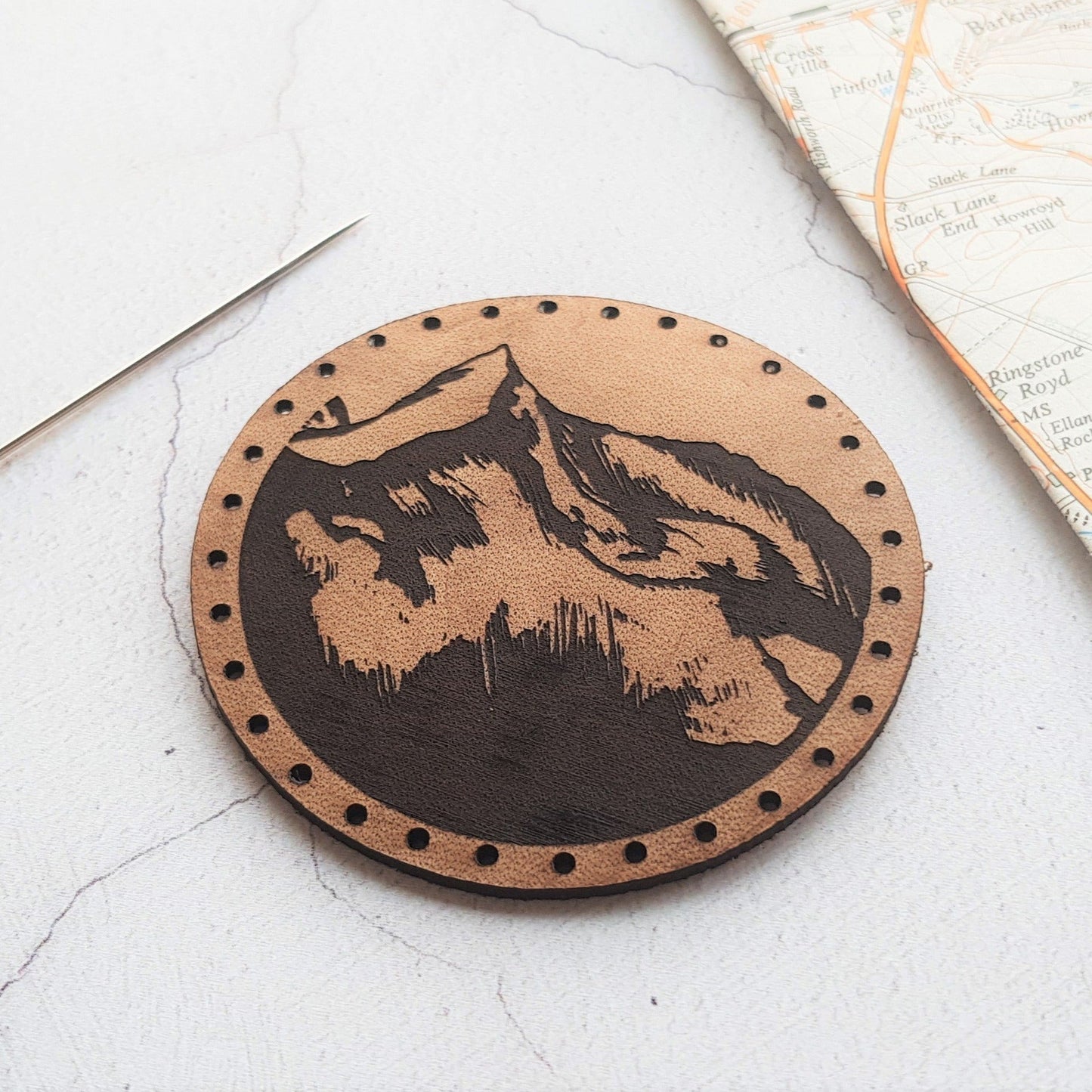 The Mountaineer Patch by Hord - This patch is cut from veg tan leather and hand dyed. It will gain a beautiful patina over time, furthering it's vintage look.