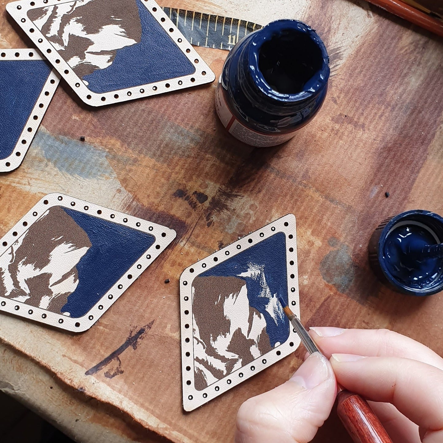 The mountaineering patch being hand painted, the perfect gift for the hiker in your life!