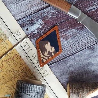 This mountaineering patch has been hand painted in vibrant colours to stand out!