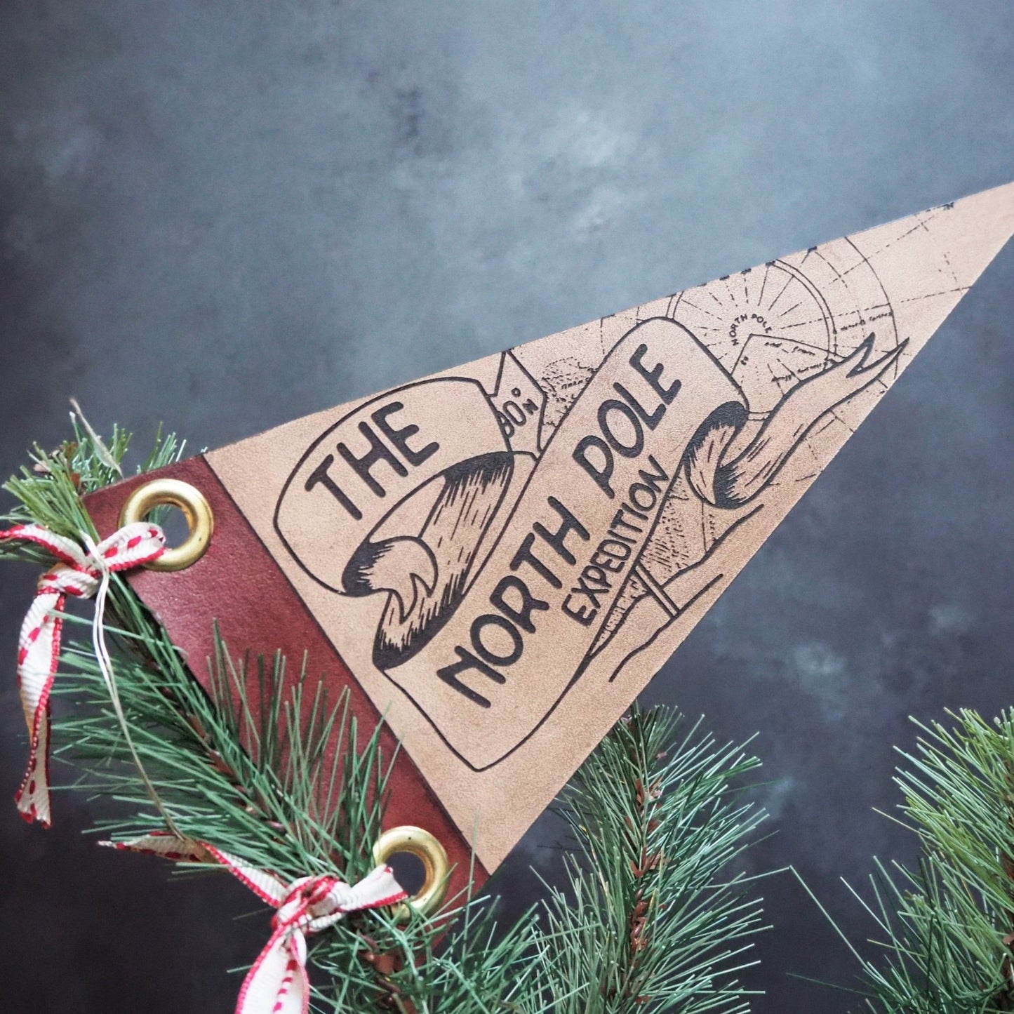 This Unique Christmas Tree Topper is engraved with our design of The North Pole Expedition to craft the perfect North Pole Christmas Decoration.