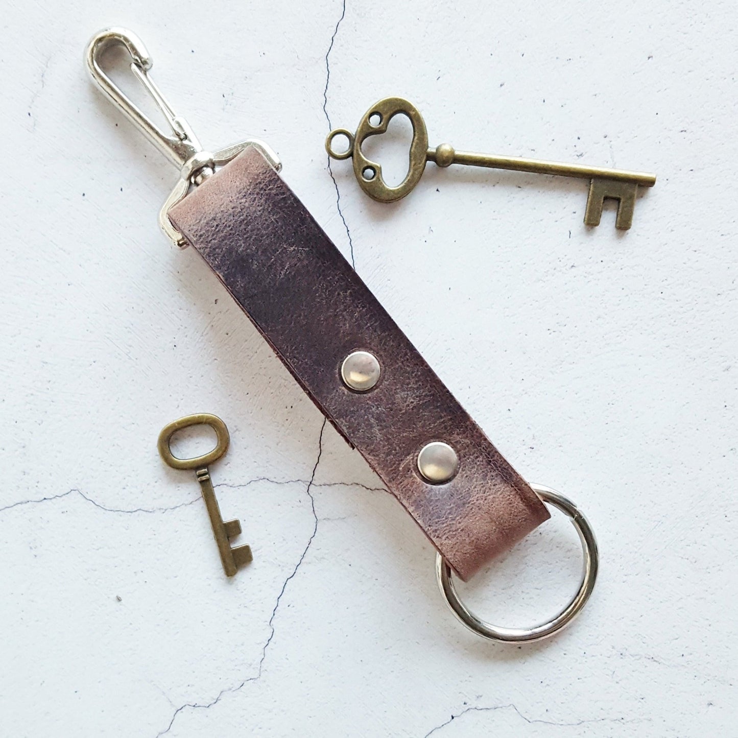 A Personalised Chunky Brown Key Fob featuring Nickel material, a personalised key fob from HÔRD.