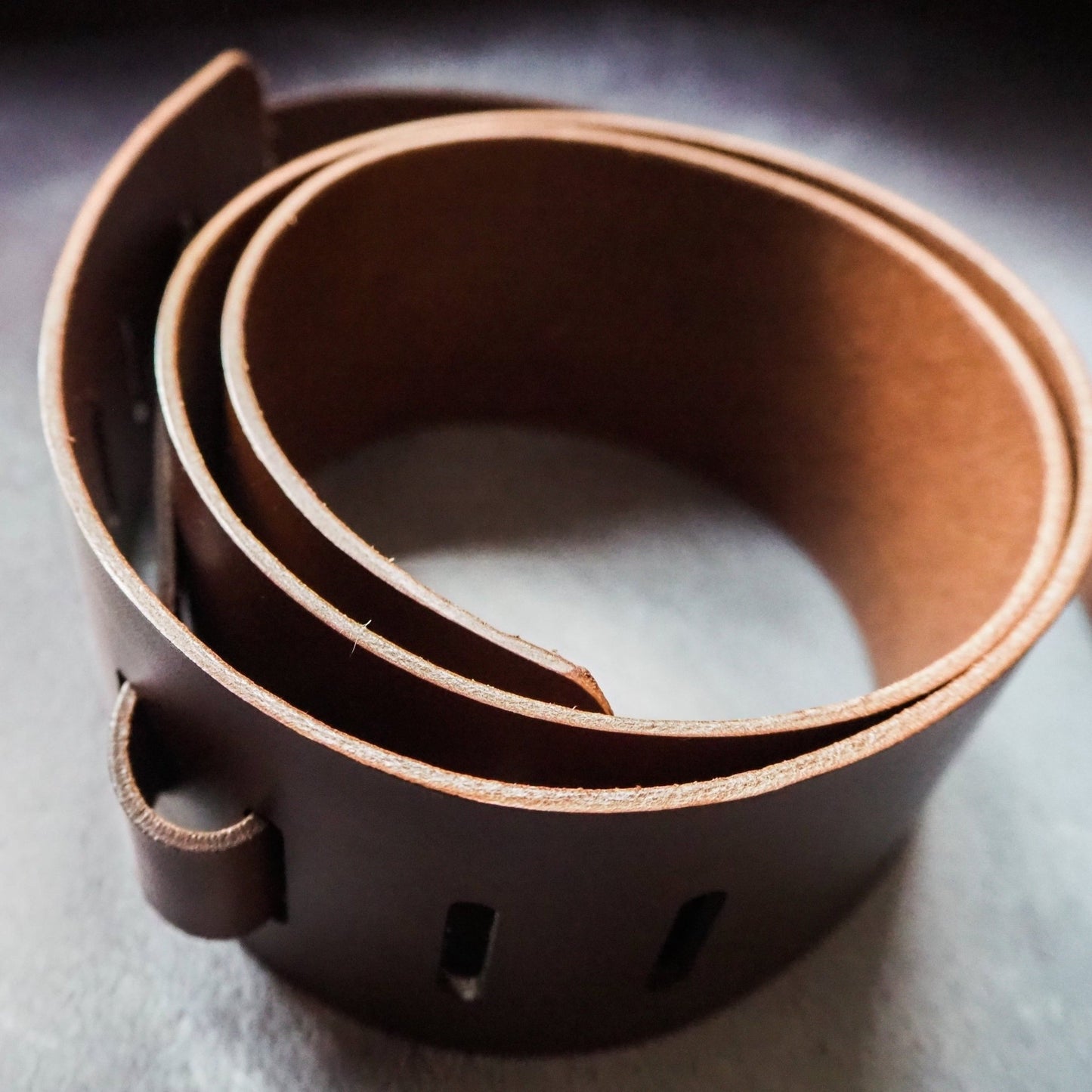 A custom leather guitar strap offering from HÔRD featuring the Personalised Thick Leather Guitar Strap.