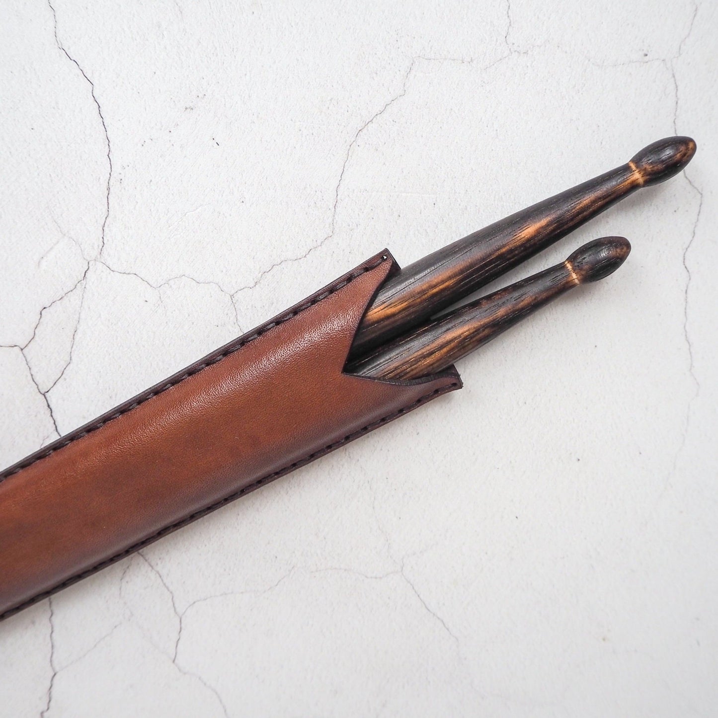 Posterior view of the Rune drumstick holder from HÔRD.