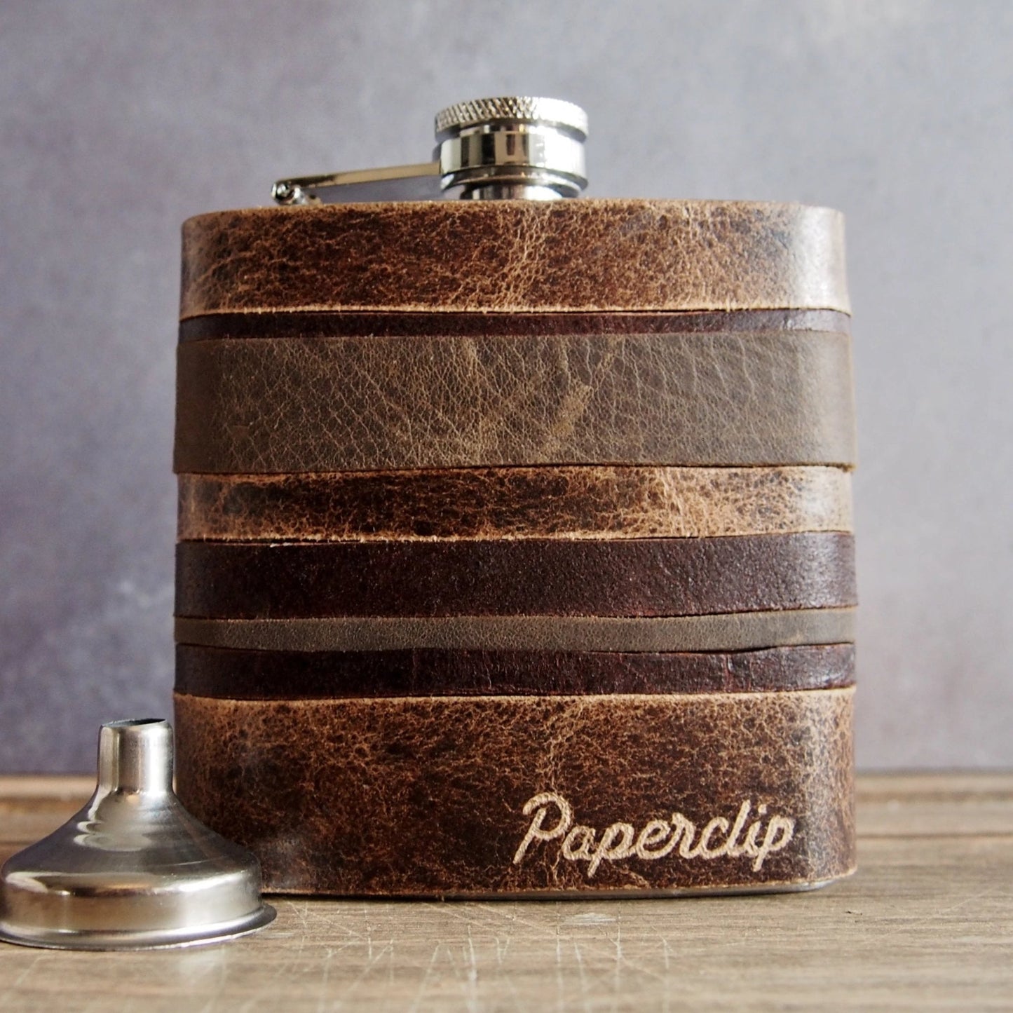 The Antique Hip Flask from Hôrd which has been crafted from remnants of Oak Layers.