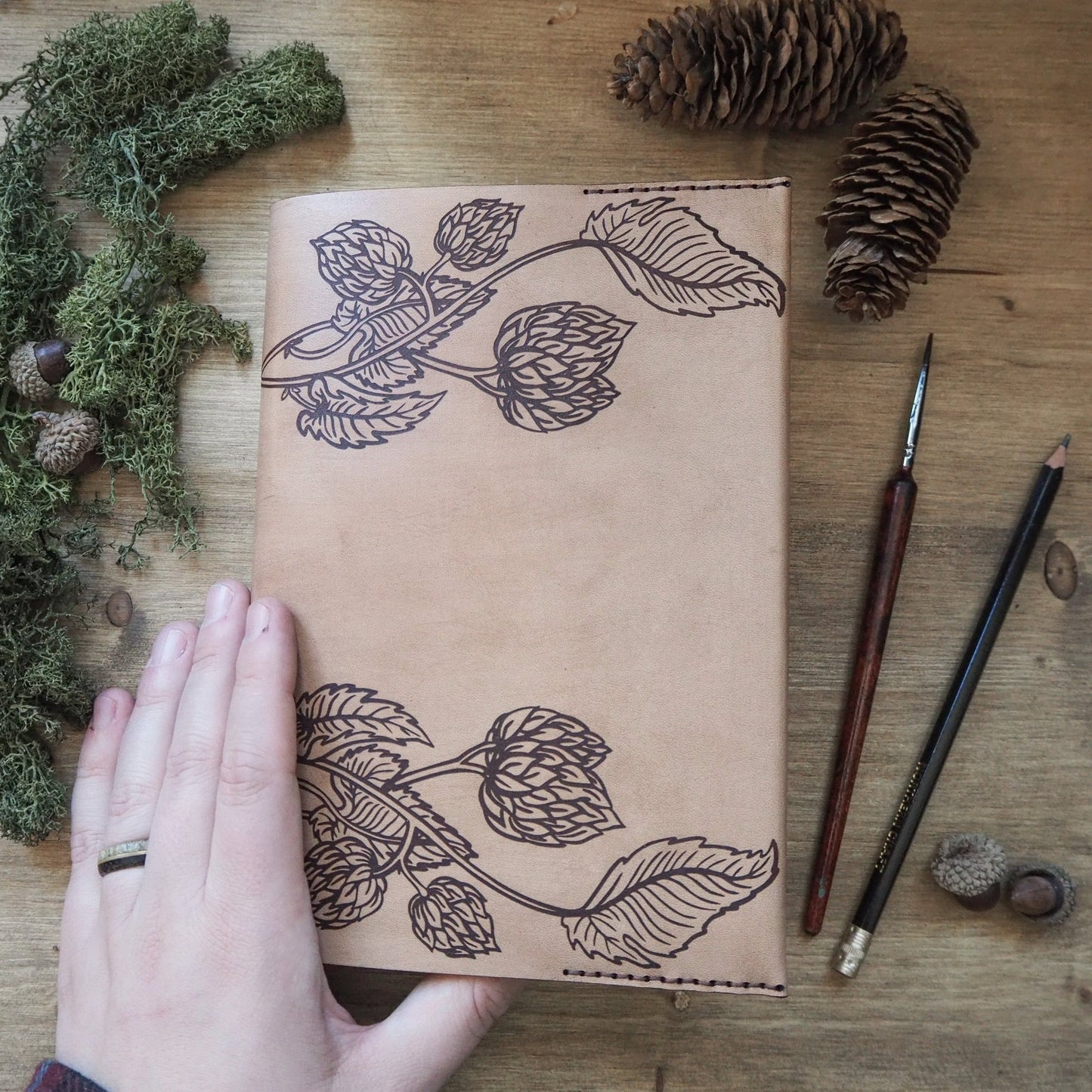 The Beer Journal featuring an engraving of hop vines. Handcrafted by HÔRD..