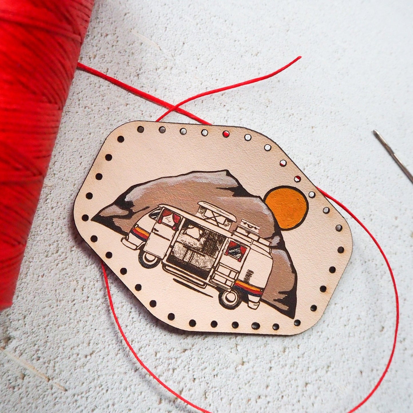 This van patch comes with pre-cut stitch holes ready to be sewed.