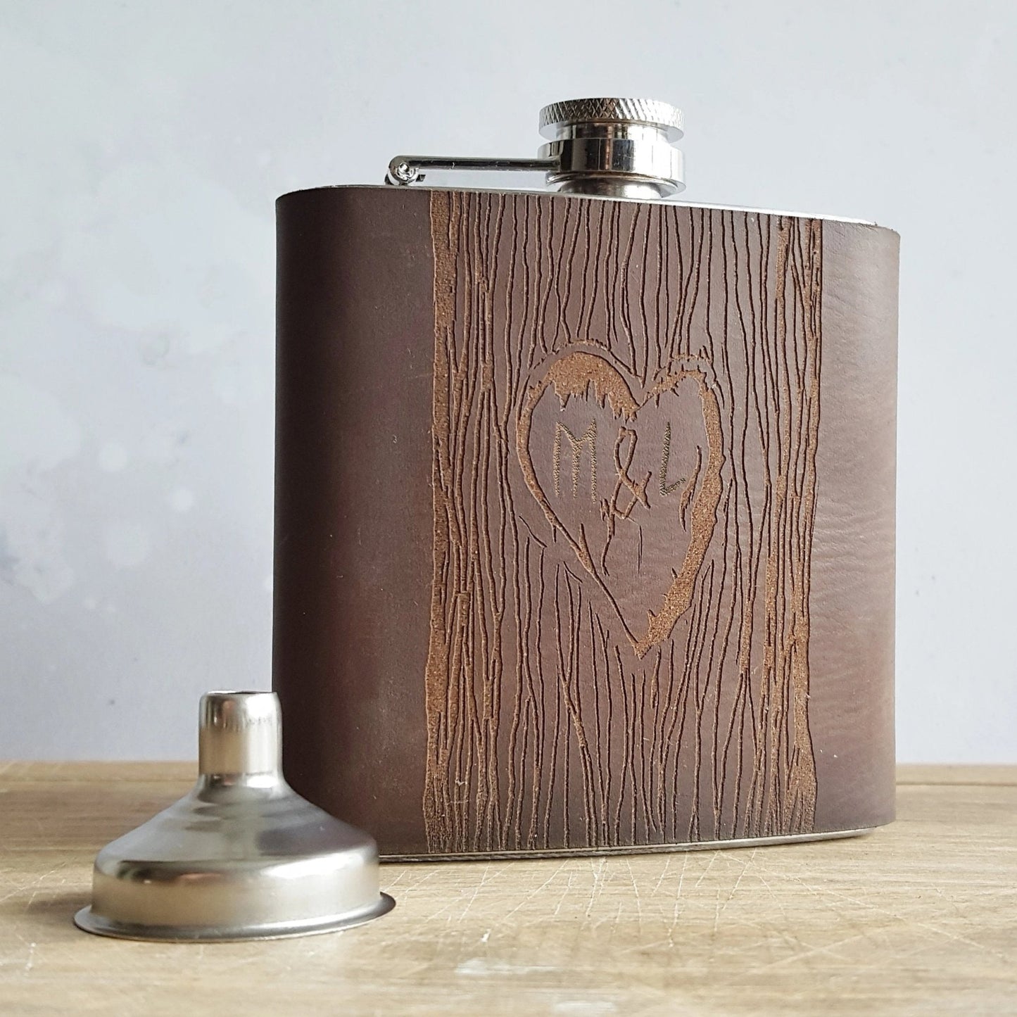 The Carved Tree Hip Flask, a heart hip flask from Hord.