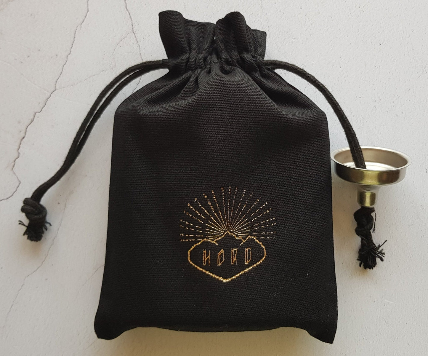 Easy to gift as the personalised leather key fob is packed in a linen bag.