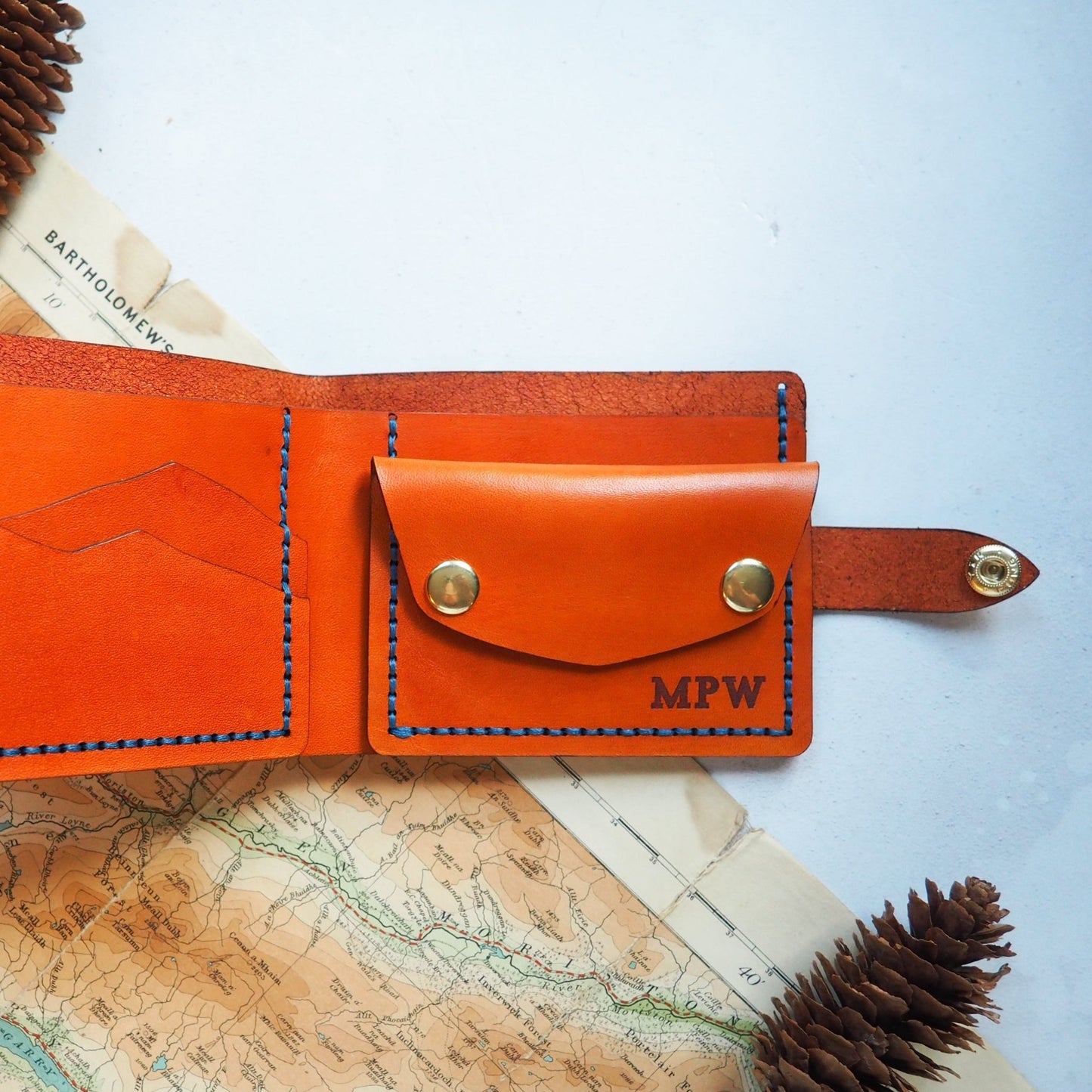 Custom initials engraved onto the personalised wallet with coin section.