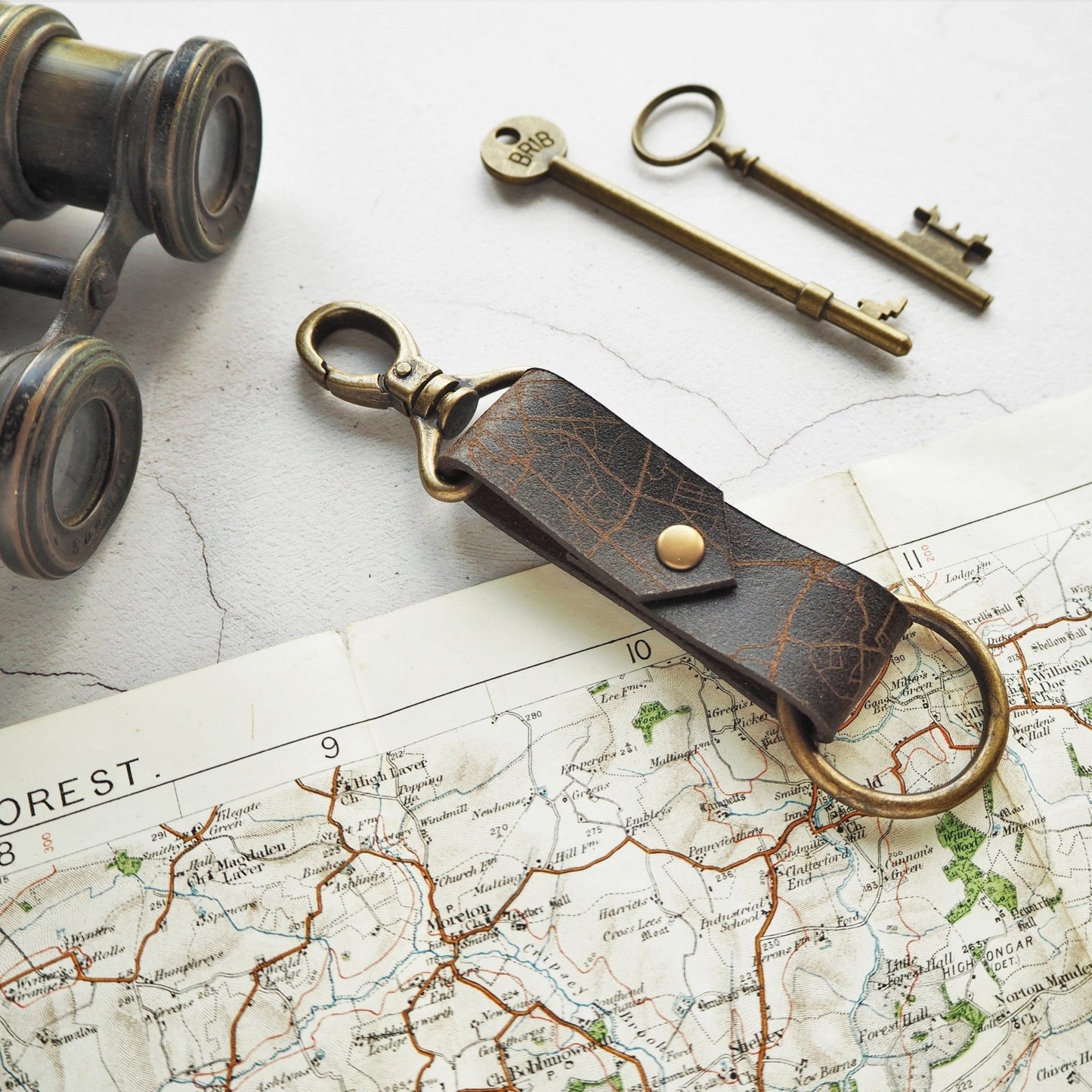 The custom road map key fob featuring your favourite place on your luxury leather keyring.