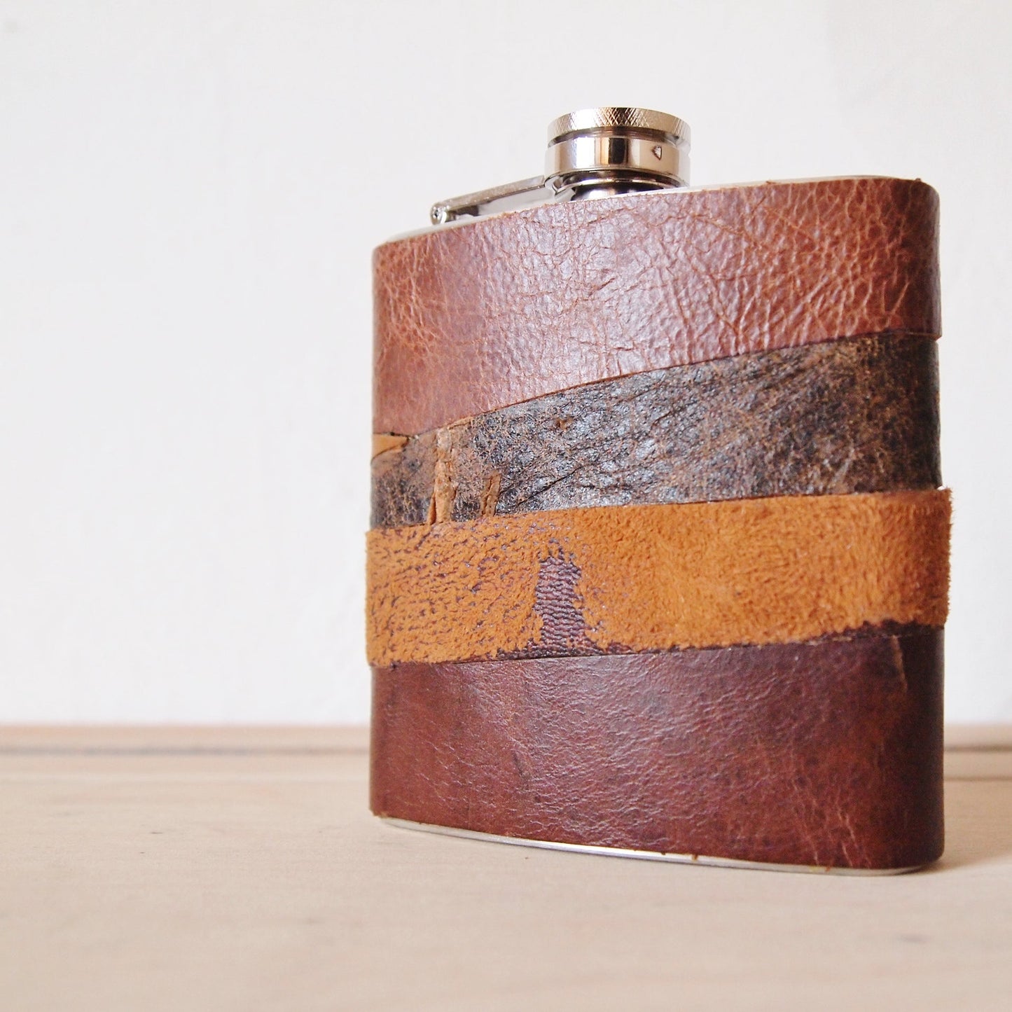 This rum flask can be personalised to include a name, or initial on the bottom right corner of the flask.