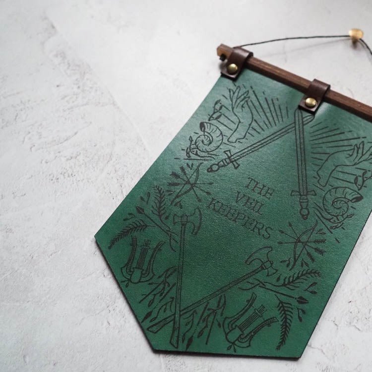 The Dungeoneers Banner, a DnD decorations leather banner offering from HÔRD for DnD Nerds and those looking for Dungeons and Dragons gifts.