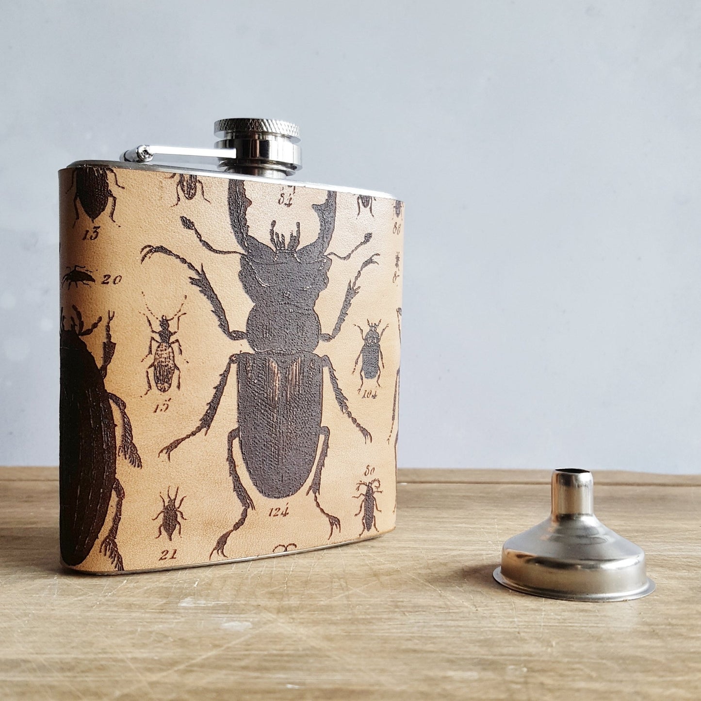 This desginer flask from Hord comes engraved with the illustration of a myriad of bugs.