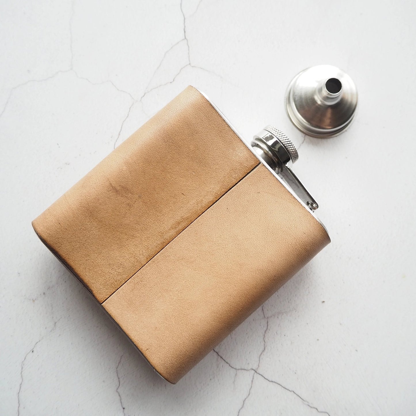 Posterior view of the fishing hip flask.