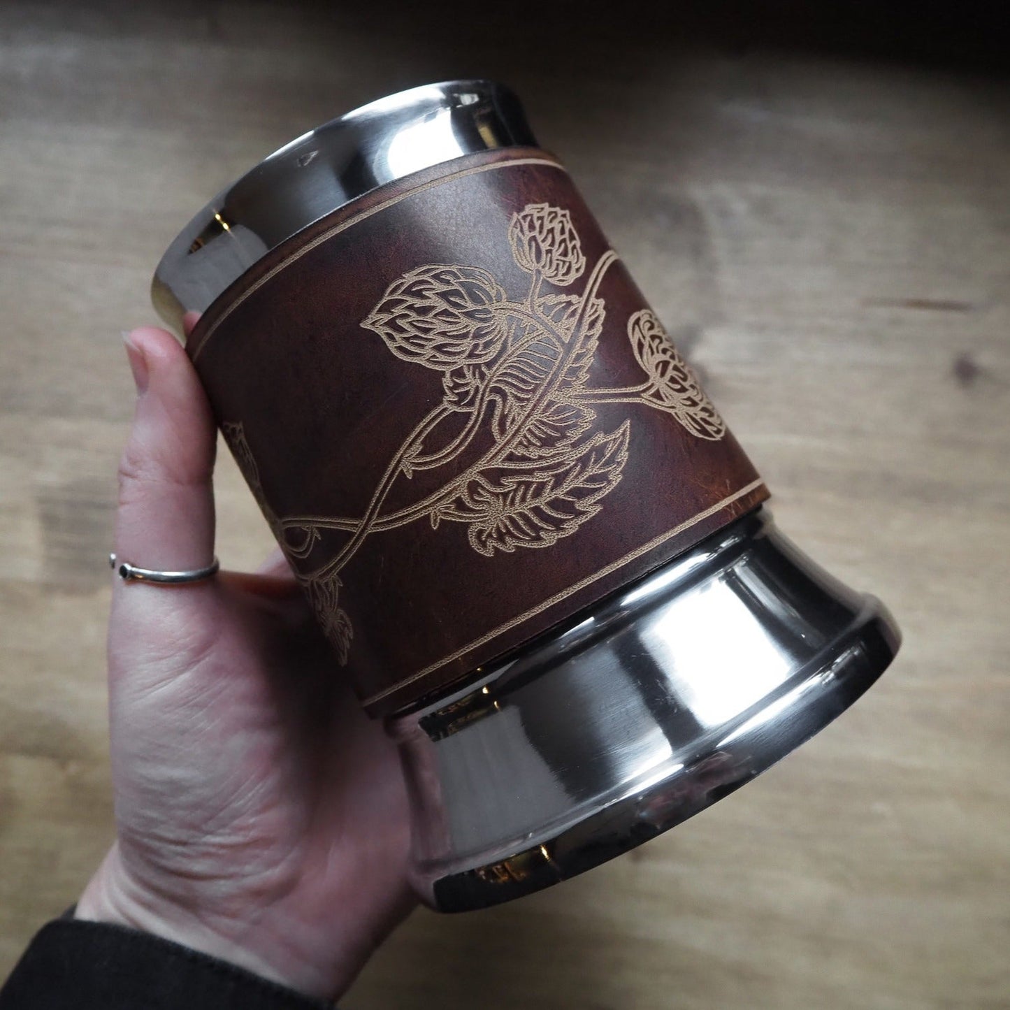 This engraved beer tankard is double insulated and would keep your drink cool or warm.