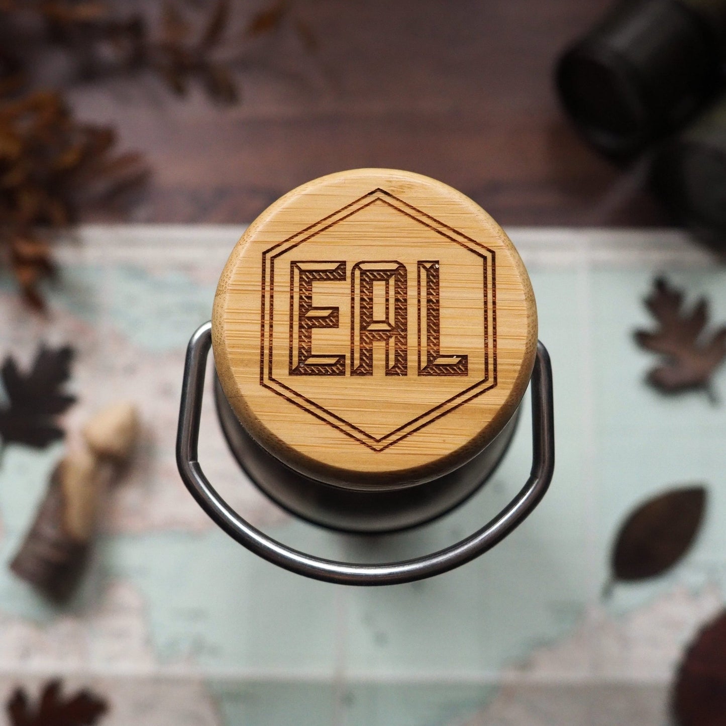 Our personalised insualated water bottles lids are engraved with initials, the lid is made of bamboo whilst the bottle is constructed of double walled stainless steel.