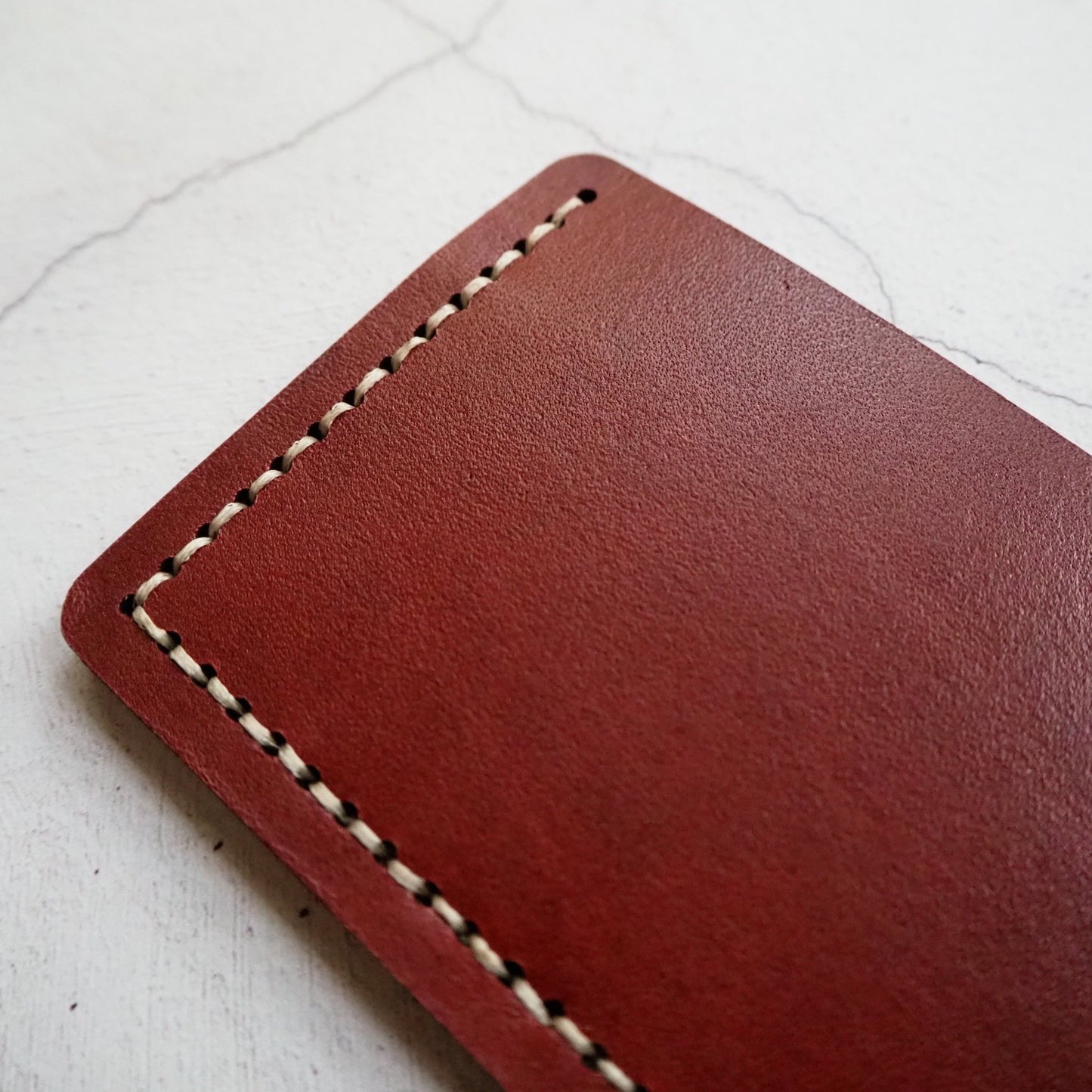The Misty Mountain Card Holder is hand dyed in your choice of colour.