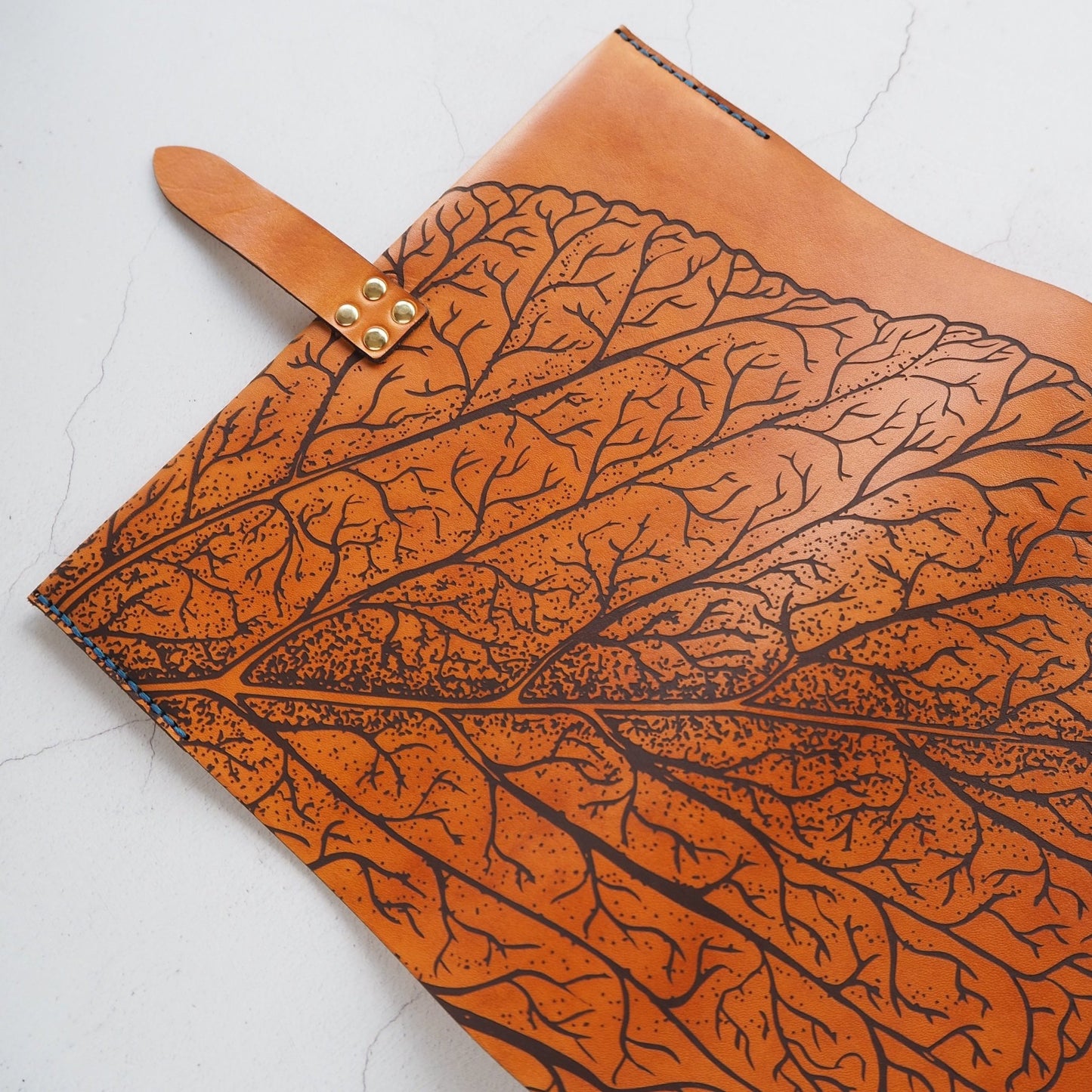 Close up on the engraving and clasp on the Mulberry Leaf Journal Cover