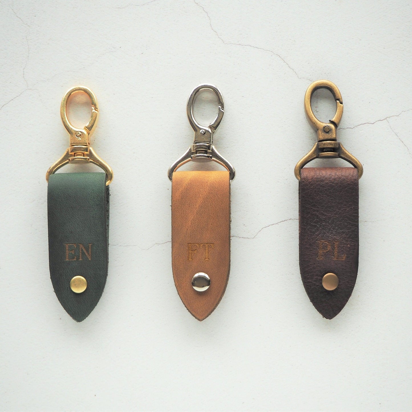 Fully personalised Rof Leather Key fob in three different colour variants.