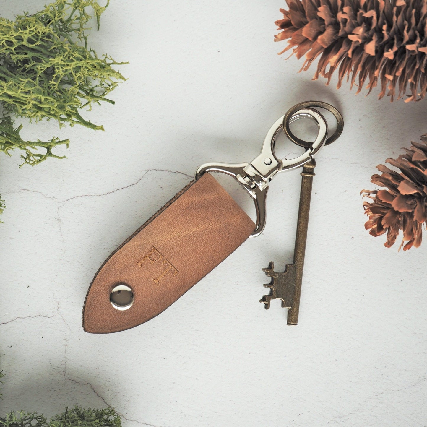 The Rof Leather Key fob with nickel hardware.