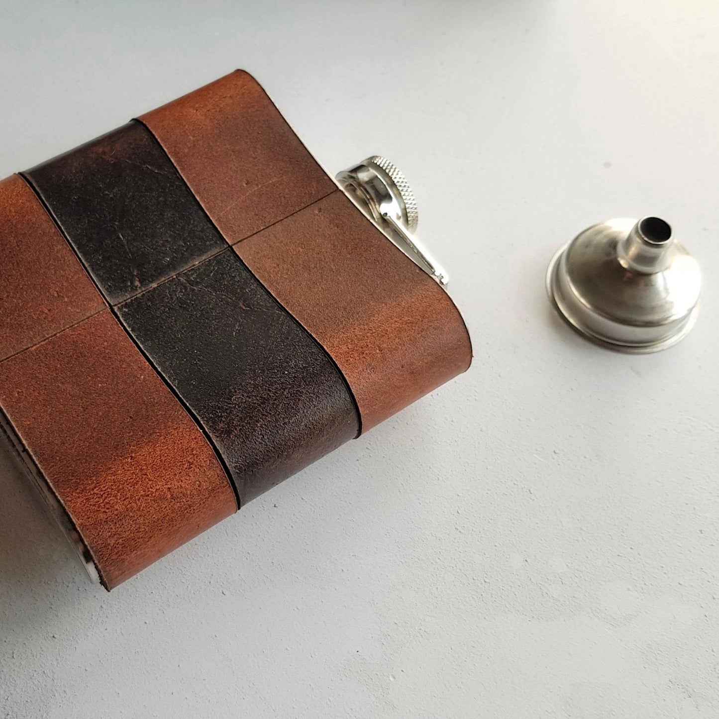 The posterior view of the Rust and Peat Leather Flask.