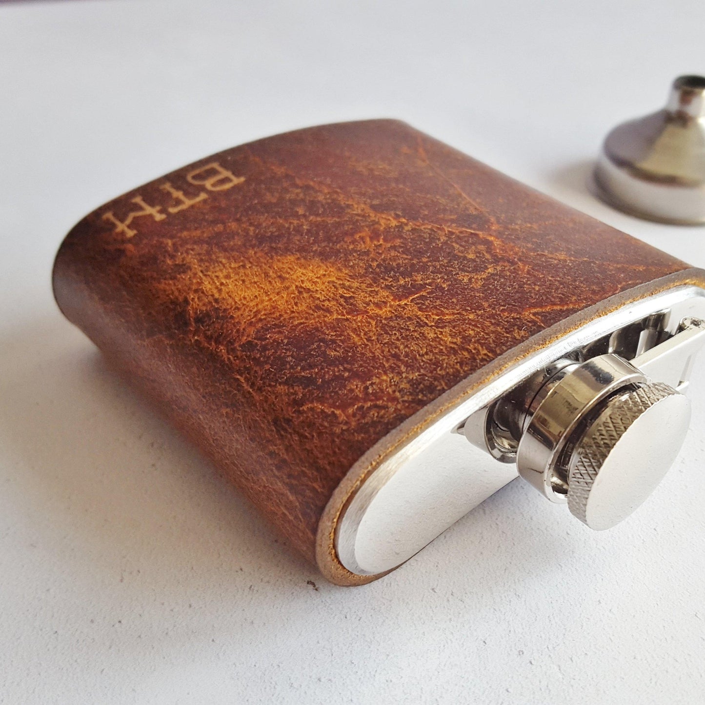The personalised whiskey flask in 3 fl oz.