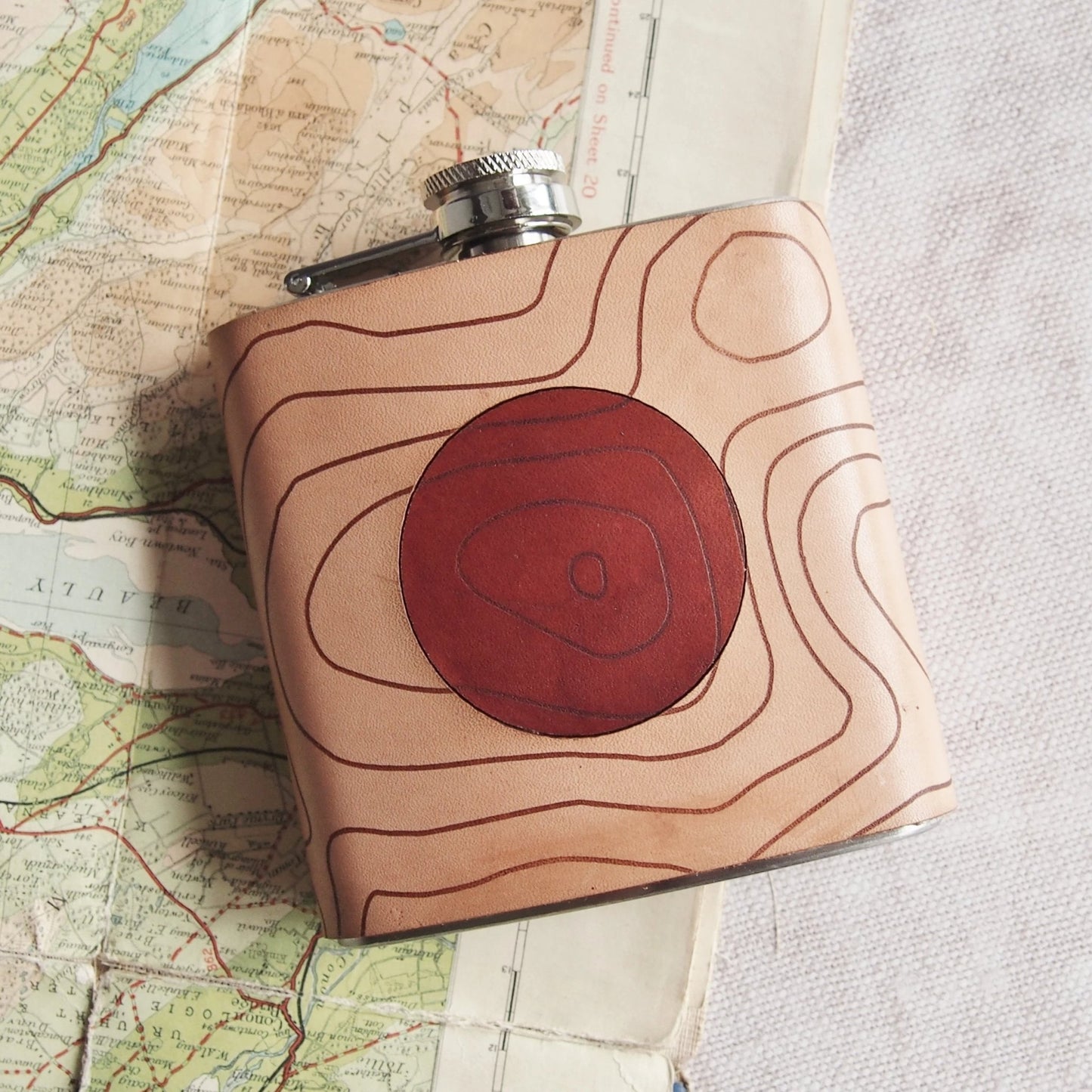 This Scafell Pike flask has been handcrafted with luxurious leather and clad onto a stainless steel flask.